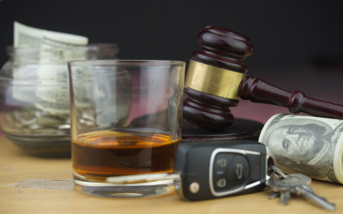 Judge hammer and whiskey glass,car key
